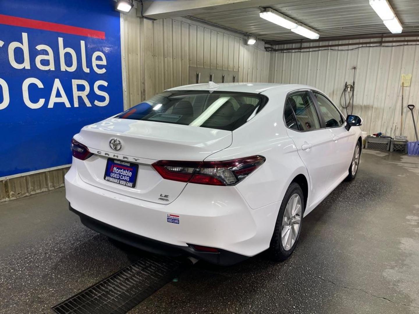 2023 WHITE TOYOTA CAMRY AWD LE LE (4T1C11BK1PU) with an 2.5L engine, Automatic transmission, located at 2525 S. Cushman, Fairbanks, AK, 99701, (907) 452-5707, 64.824036, -147.712311 - Photo#2