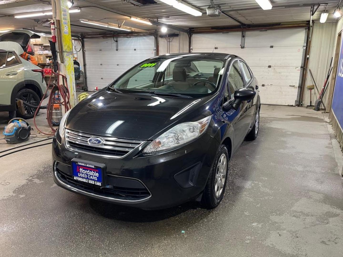 2011 BLACK FORD FIESTA SE (3FADP4BJ0BM) with an 1.6L engine, Automatic transmission, located at 2525 S. Cushman, Fairbanks, AK, 99701, (907) 452-5707, 64.824036, -147.712311 - Photo#1