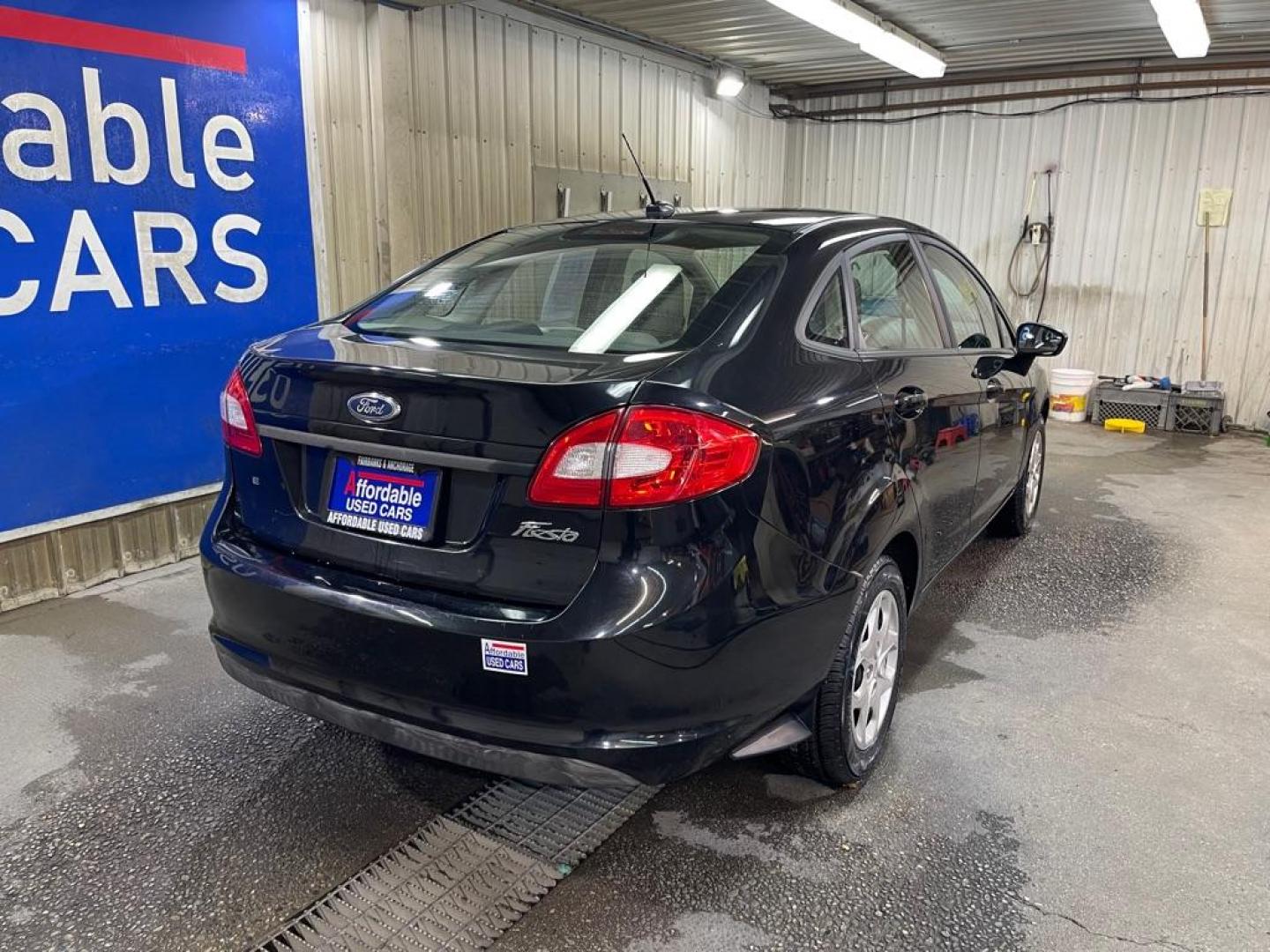 2011 BLACK FORD FIESTA SE (3FADP4BJ0BM) with an 1.6L engine, Automatic transmission, located at 2525 S. Cushman, Fairbanks, AK, 99701, (907) 452-5707, 64.824036, -147.712311 - Photo#2