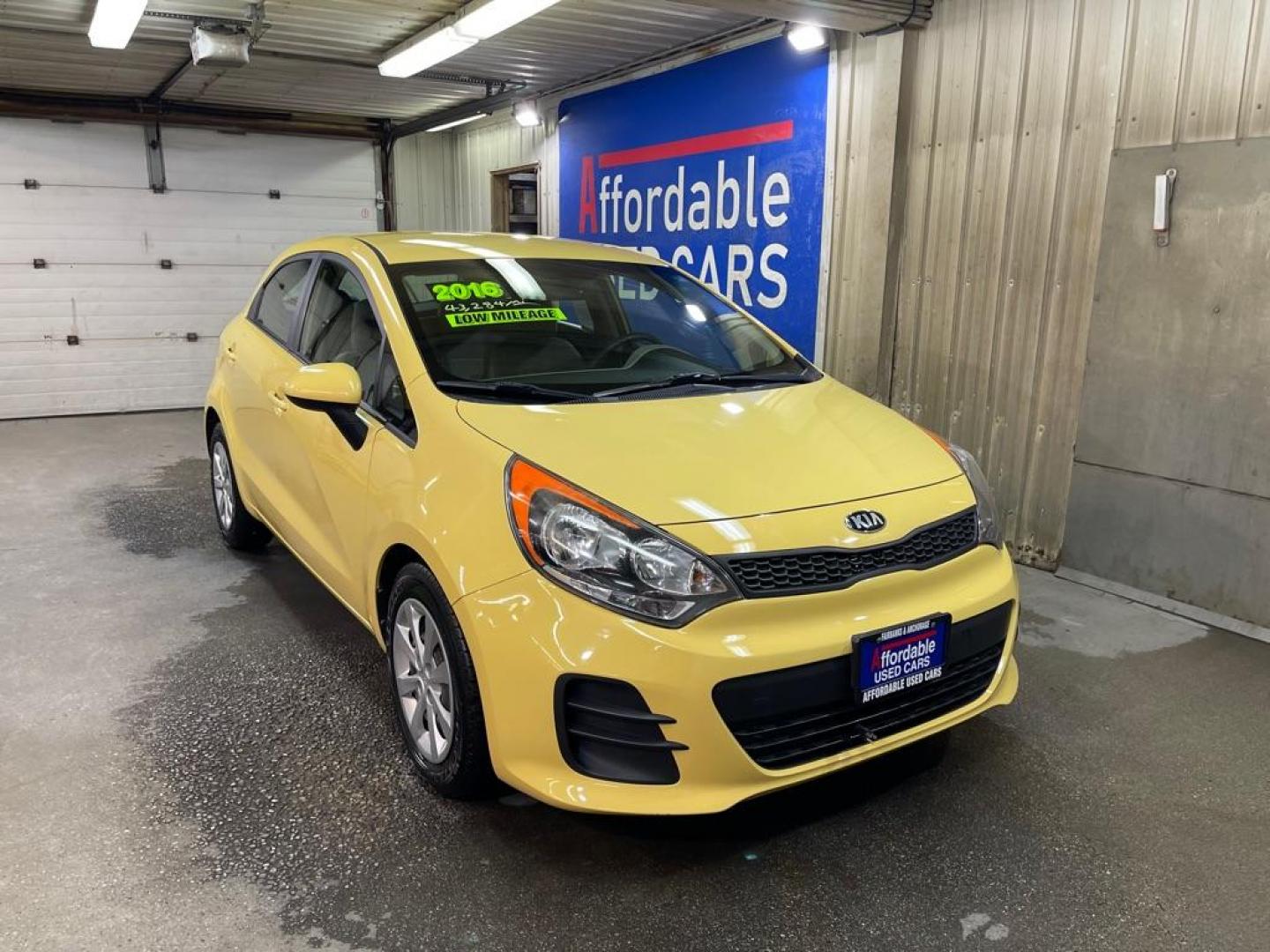 2016 YELLOW KIA RIO LX (KNADM5A3XG6) with an 1.6L engine, Automatic transmission, located at 2525 S. Cushman, Fairbanks, AK, 99701, (907) 452-5707, 64.824036, -147.712311 - Photo#0