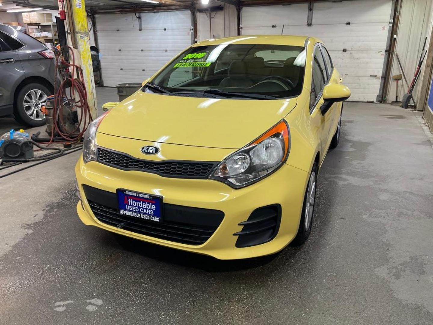 2016 YELLOW KIA RIO LX (KNADM5A3XG6) with an 1.6L engine, Automatic transmission, located at 2525 S. Cushman, Fairbanks, AK, 99701, (907) 452-5707, 64.824036, -147.712311 - Photo#1