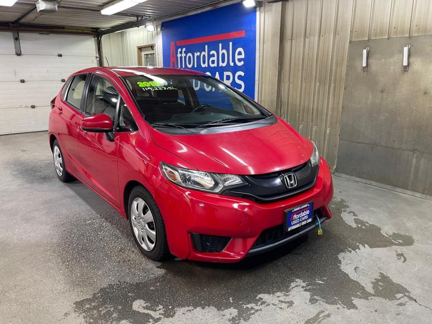 2016 RED HONDA FIT LX (JHMGK5H53GS) with an 1.5L engine, Continuously Variable transmission, located at 2525 S. Cushman, Fairbanks, AK, 99701, (907) 452-5707, 64.824036, -147.712311 - Photo#0