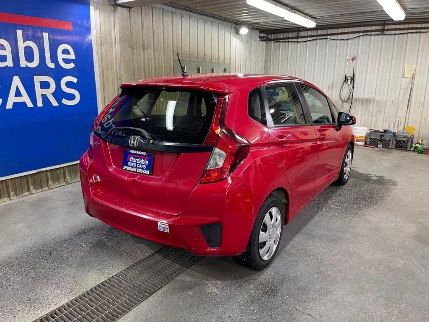 2016 RED HONDA FIT LX (JHMGK5H53GS) with an 1.5L engine, Continuously Variable transmission, located at 2525 S. Cushman, Fairbanks, AK, 99701, (907) 452-5707, 64.824036, -147.712311 - Photo#2