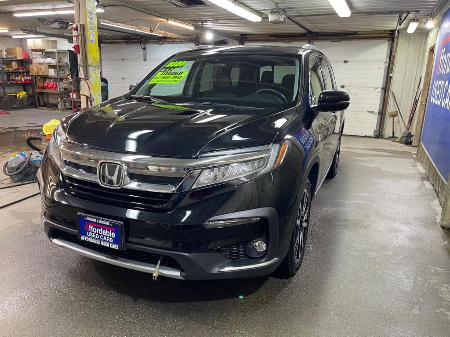 2020 BLACK HONDA PILOT ELITE (5FNYF6H05LB) with an 3.5L engine, Automatic transmission, located at 2525 S. Cushman, Fairbanks, AK, 99701, (907) 452-5707, 64.824036, -147.712311 - Photo#1