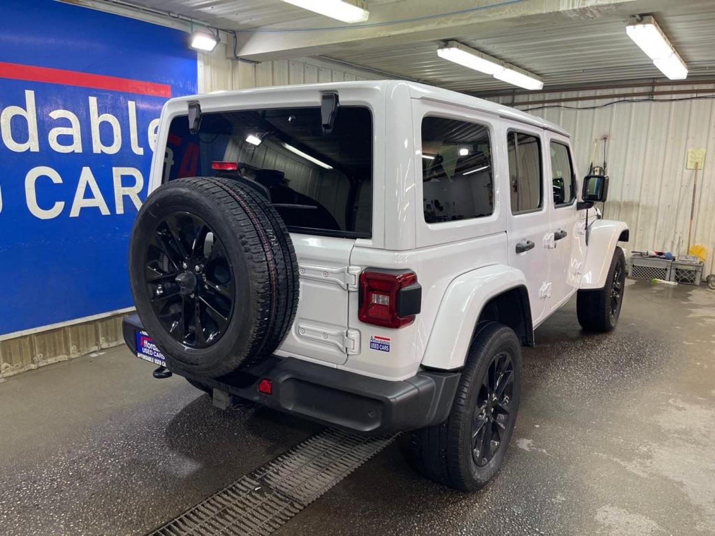 2021 WHITE JEEP WRANGLER UNLIMI SAHARA 4XE (1C4JJXP6XMW) with an 2.0L engine, Automatic transmission, located at 2525 S. Cushman, Fairbanks, AK, 99701, (907) 452-5707, 64.824036, -147.712311 - Photo#2