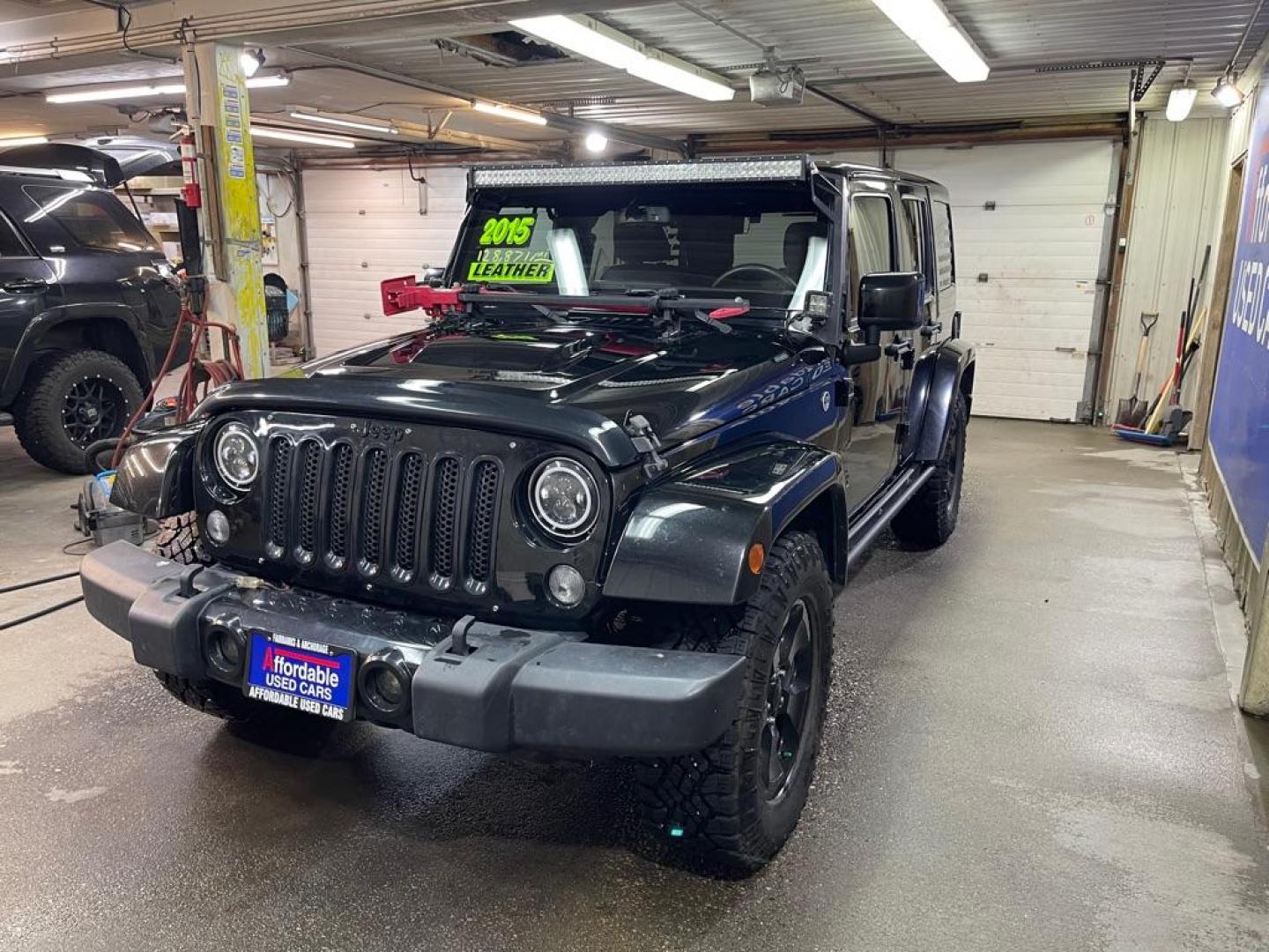 2015 BLACK JEEP WRANGLER UNLIMI SAHARA (1C4BJWEG6FL) with an 3.6L engine, Automatic transmission, located at 2525 S. Cushman, Fairbanks, AK, 99701, (907) 452-5707, 64.824036, -147.712311 - Photo#1