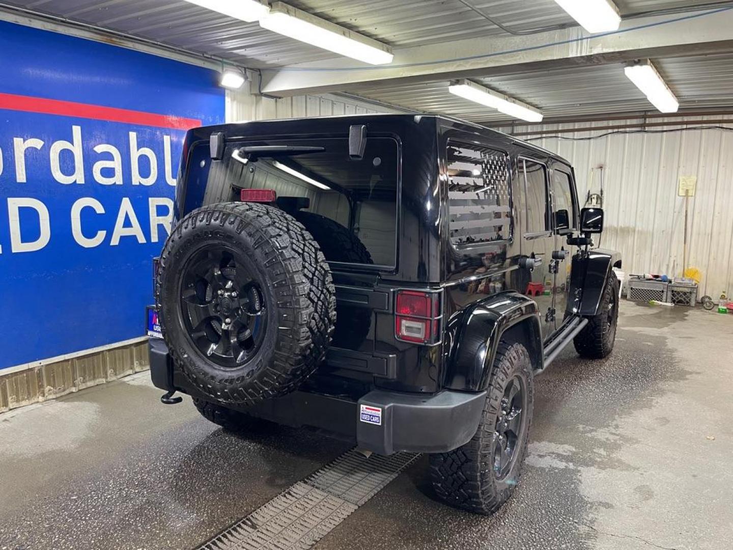 2015 BLACK JEEP WRANGLER UNLIMI SAHARA (1C4BJWEG6FL) with an 3.6L engine, Automatic transmission, located at 2525 S. Cushman, Fairbanks, AK, 99701, (907) 452-5707, 64.824036, -147.712311 - Photo#2