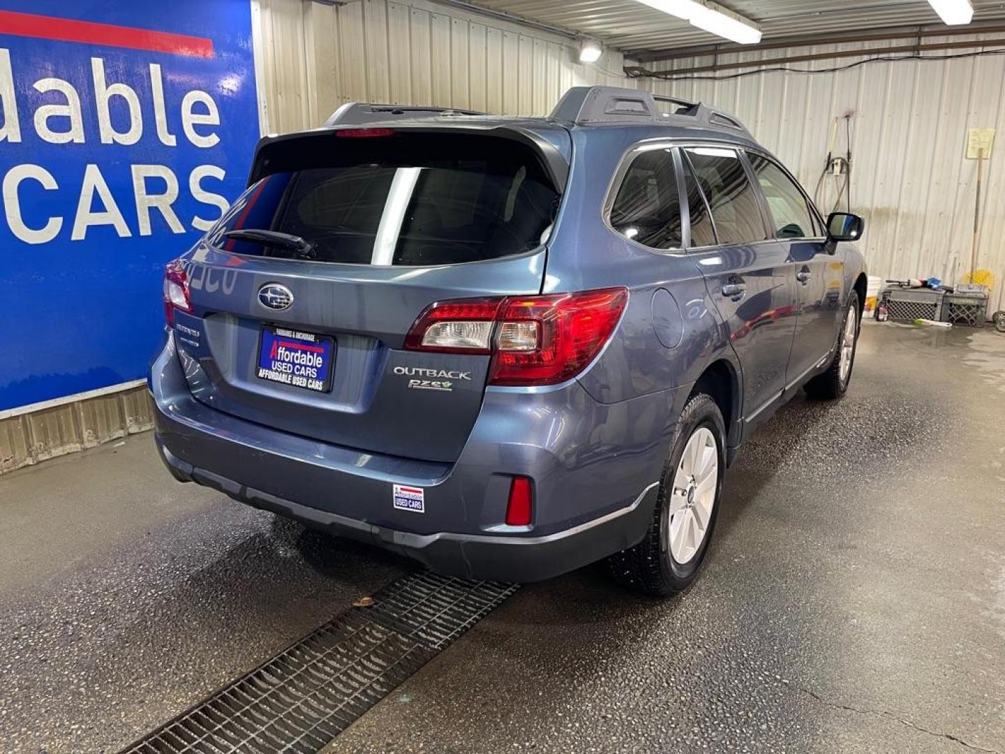 2015 BLUE SUBARU OUTBACK 2.5I PREMIUM (4S4BSACC7F3) with an 2.5L engine, Continuously Variable transmission, located at 2525 S. Cushman, Fairbanks, AK, 99701, (907) 452-5707, 64.824036, -147.712311 - Photo#2