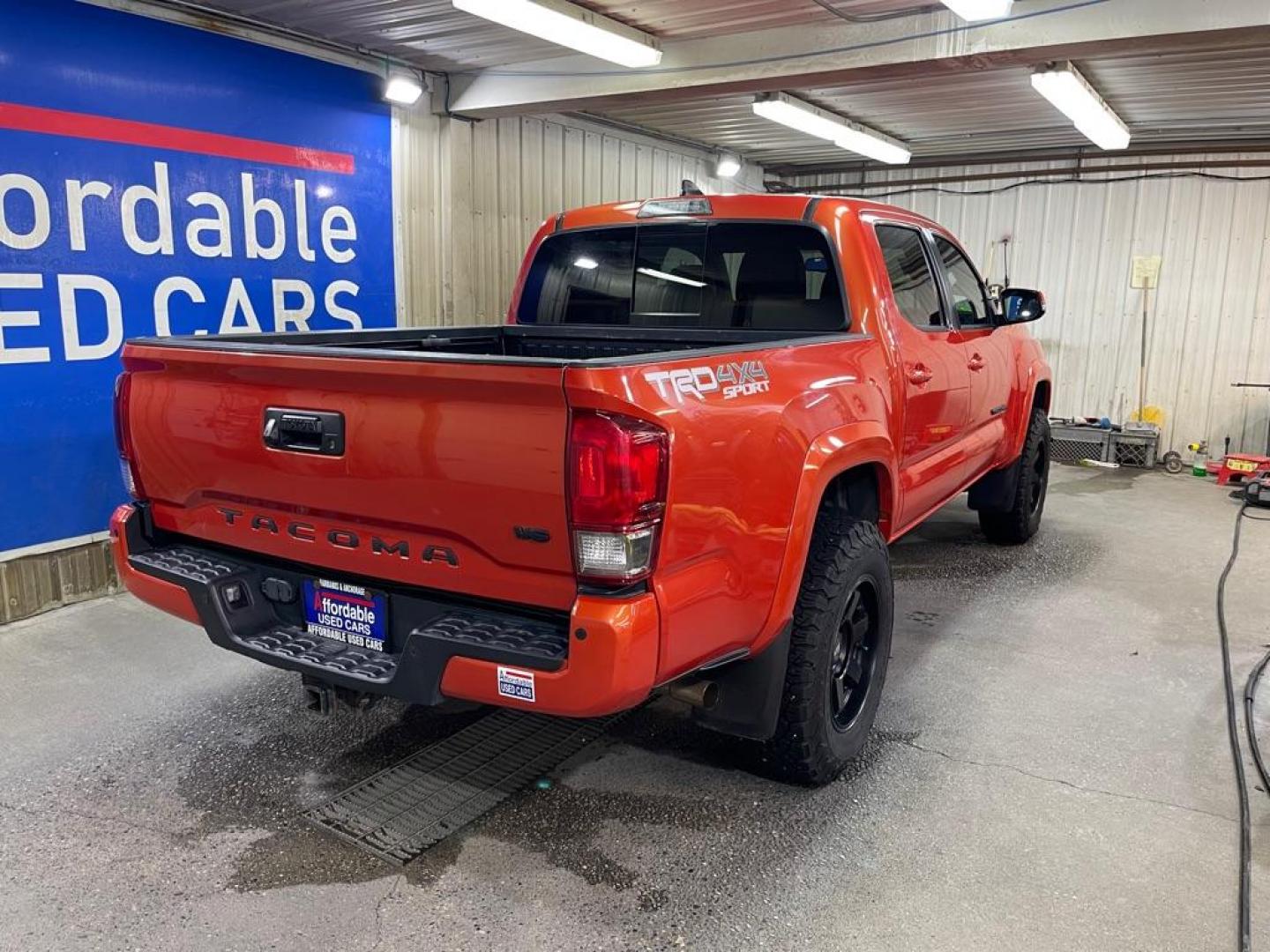 2017 ORANGE TOYOTA TACOMA DOUBLE CAB (3TMCZ5AN9HM) with an 3.5L engine, Automatic transmission, located at 2525 S. Cushman, Fairbanks, AK, 99701, (907) 452-5707, 64.824036, -147.712311 - Photo#2