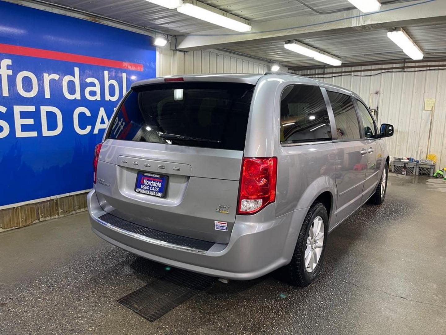 2014 SILVER DODGE GRAND CARAVAN SXT (2C4RDGCG0ER) with an 3.6L engine, Automatic transmission, located at 2525 S. Cushman, Fairbanks, AK, 99701, (907) 452-5707, 64.824036, -147.712311 - Photo#2