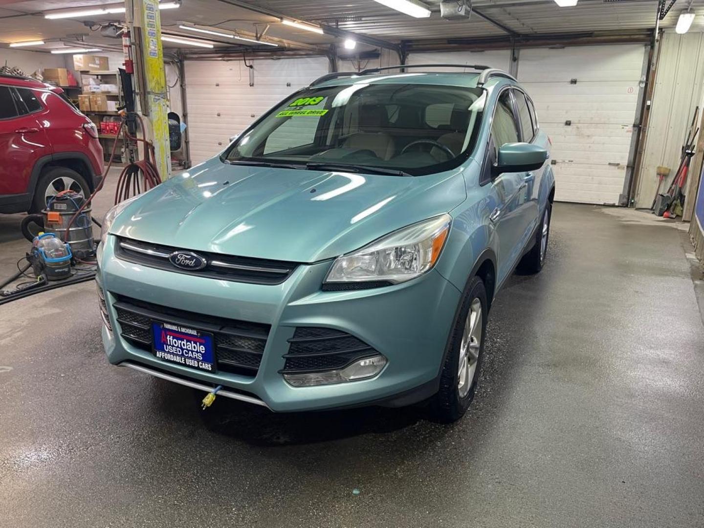 2013 GREEN FORD ESCAPE SE (1FMCU9GX8DU) with an 1.6L engine, Automatic transmission, located at 2525 S. Cushman, Fairbanks, AK, 99701, (907) 452-5707, 64.824036, -147.712311 - Photo#1