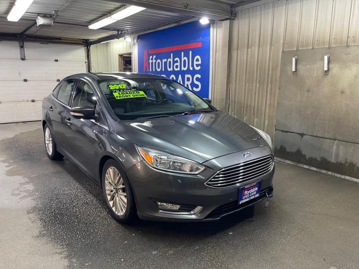 2017 GREY FORD FOCUS TITANIUM (1FADP3J26HL) with an 2.0L engine, Automatic transmission, located at 2525 S. Cushman, Fairbanks, AK, 99701, (907) 452-5707, 64.824036, -147.712311 - Photo#0