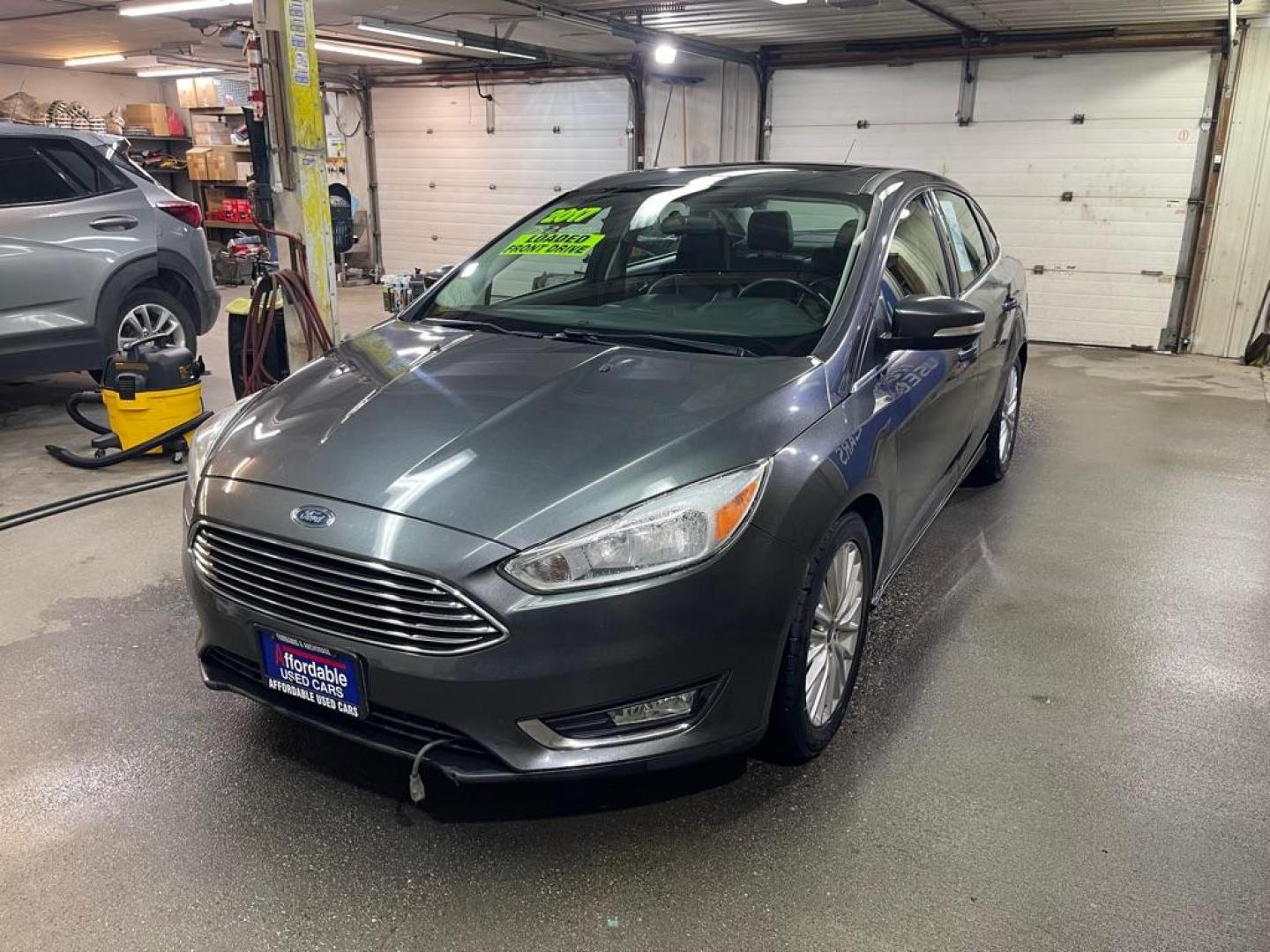 2017 GREY FORD FOCUS TITANIUM (1FADP3J26HL) with an 2.0L engine, Automatic transmission, located at 2525 S. Cushman, Fairbanks, AK, 99701, (907) 452-5707, 64.824036, -147.712311 - Photo#1
