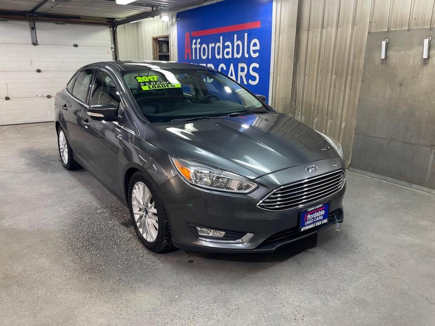 2017 BLACK FORD FOCUS TITANIUM (1FADP3J26HL) with an 2.0L engine, Automatic transmission, located at 2525 S. Cushman, Fairbanks, AK, 99701, (907) 452-5707, 64.824036, -147.712311 - Photo#0