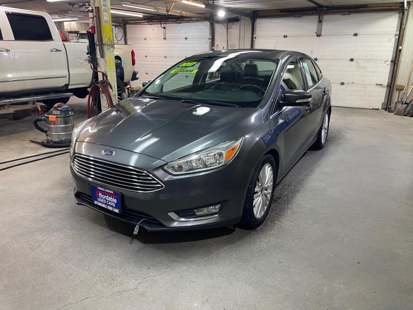 2017 BLACK FORD FOCUS TITANIUM (1FADP3J26HL) with an 2.0L engine, Automatic transmission, located at 2525 S. Cushman, Fairbanks, AK, 99701, (907) 452-5707, 64.824036, -147.712311 - Photo#1