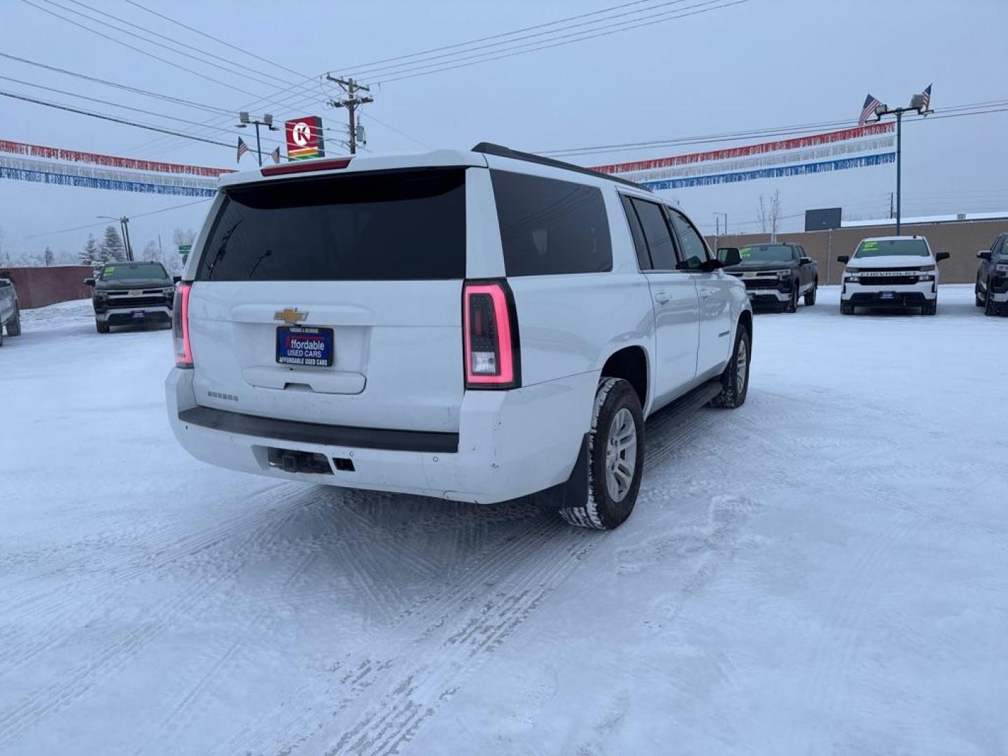 2019 WHITE CHEVROLET SUBURBAN 1500 LS (1GNSKGKC4KR) with an 5.3L engine, Automatic transmission, located at 2525 S. Cushman, Fairbanks, AK, 99701, (907) 452-5707, 64.824036, -147.712311 - Photo#2