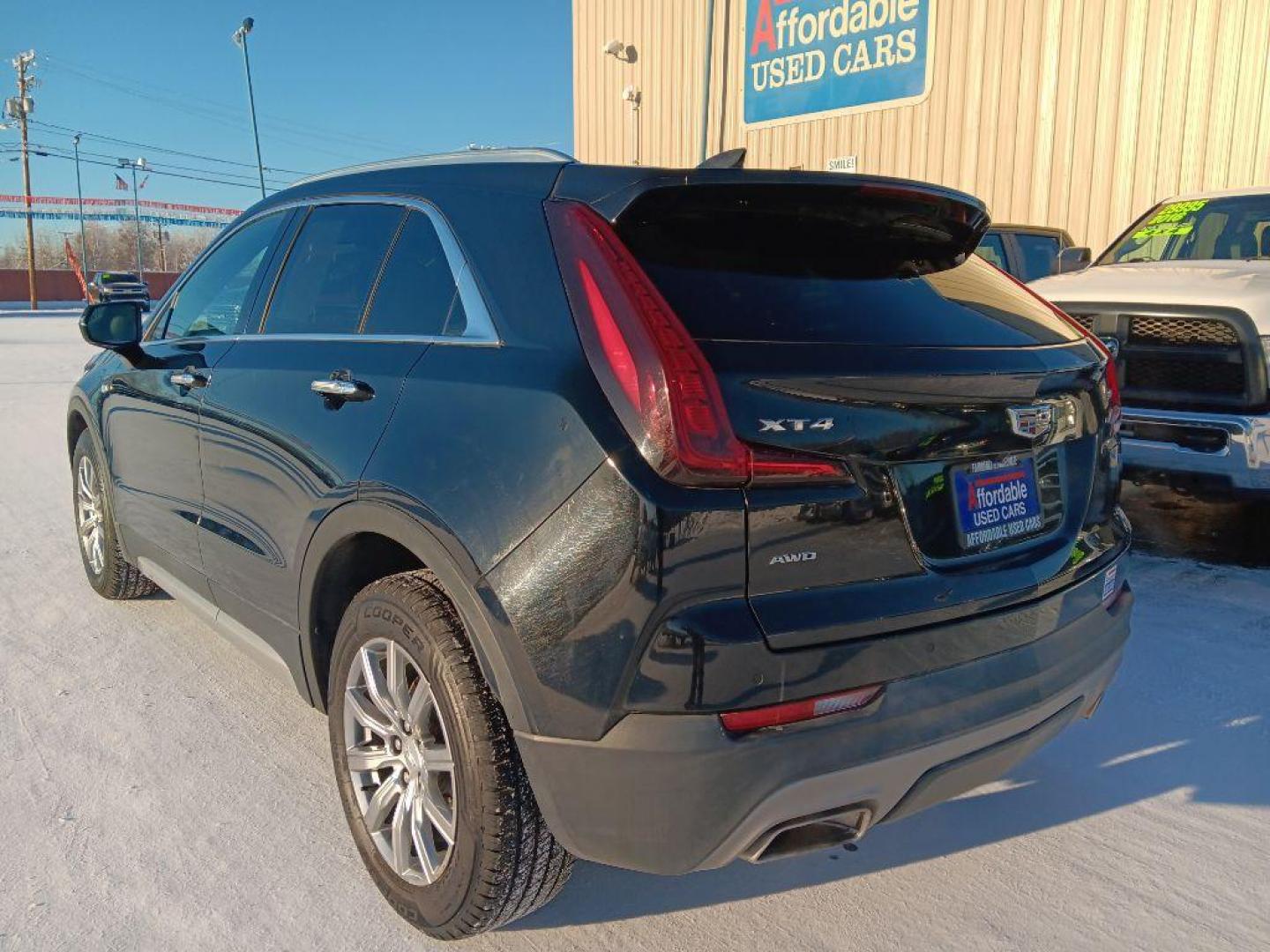 2021 BLACK CADILLAC XT4 PREMIUM LUXURY (1GYFZDR42MF) with an 2.0L engine, Automatic transmission, located at 2525 S. Cushman, Fairbanks, AK, 99701, (907) 452-5707, 64.824036, -147.712311 - Photo#5