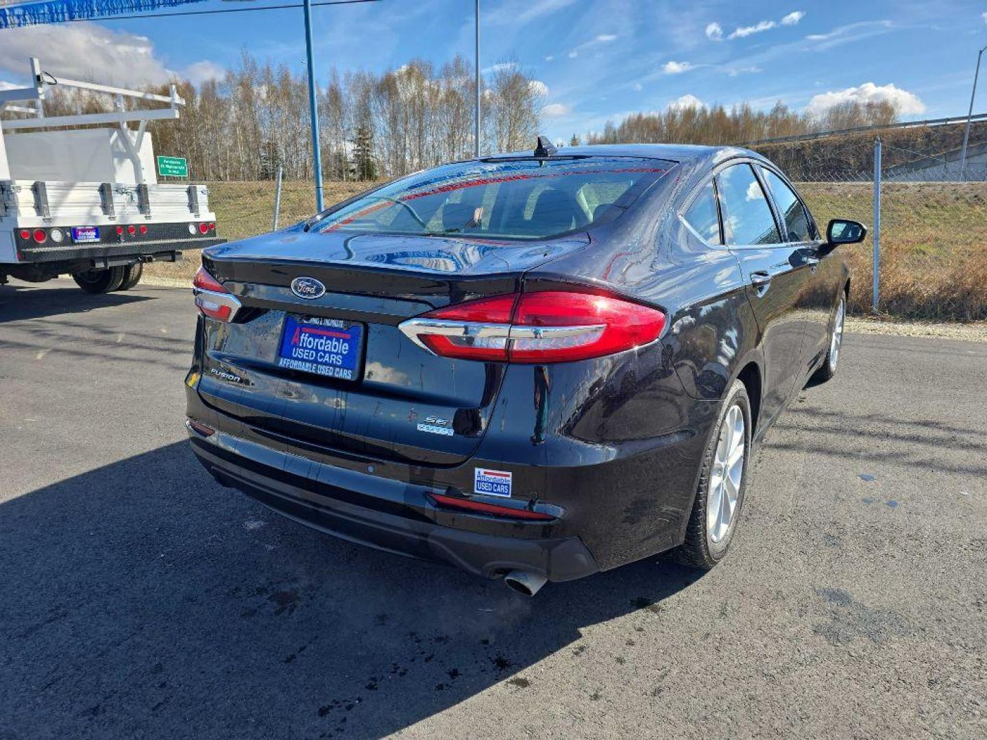 2020 BLACK FORD FUSION SE (3FA6P0HD9LR) with an 1.5L engine, Automatic transmission, located at 2525 S. Cushman, Fairbanks, AK, 99701, (907) 452-5707, 64.824036, -147.712311 - Photo#4