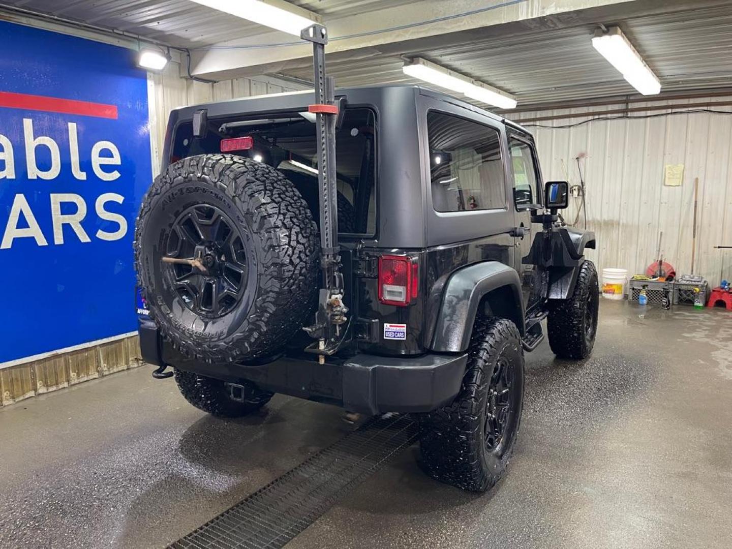 2015 BLACK JEEP WRANGLER SPORT (1C4AJWAG8FL) with an 3.6L engine, Automatic transmission, located at 2525 S. Cushman, Fairbanks, AK, 99701, (907) 452-5707, 64.824036, -147.712311 - Photo#2