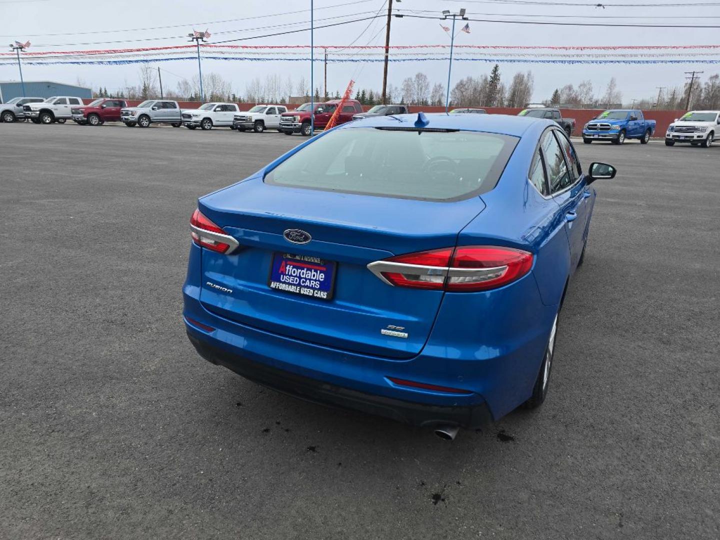 2019 BLUE FORD FUSION SE (3FA6P0HD2KR) with an 1.5L engine, Automatic transmission, located at 2525 S. Cushman, Fairbanks, AK, 99701, (907) 452-5707, 64.824036, -147.712311- Photo#2
