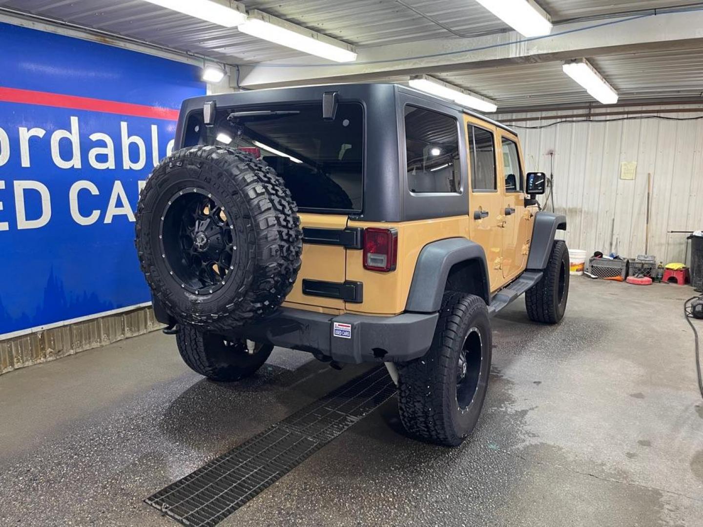 2013 TAN JEEP WRANGLER UNLIMI SPORT (1C4BJWDG1DL) with an 3.6L engine, Automatic transmission, located at 2525 S. Cushman, Fairbanks, AK, 99701, (907) 452-5707, 64.824036, -147.712311 - Photo#2