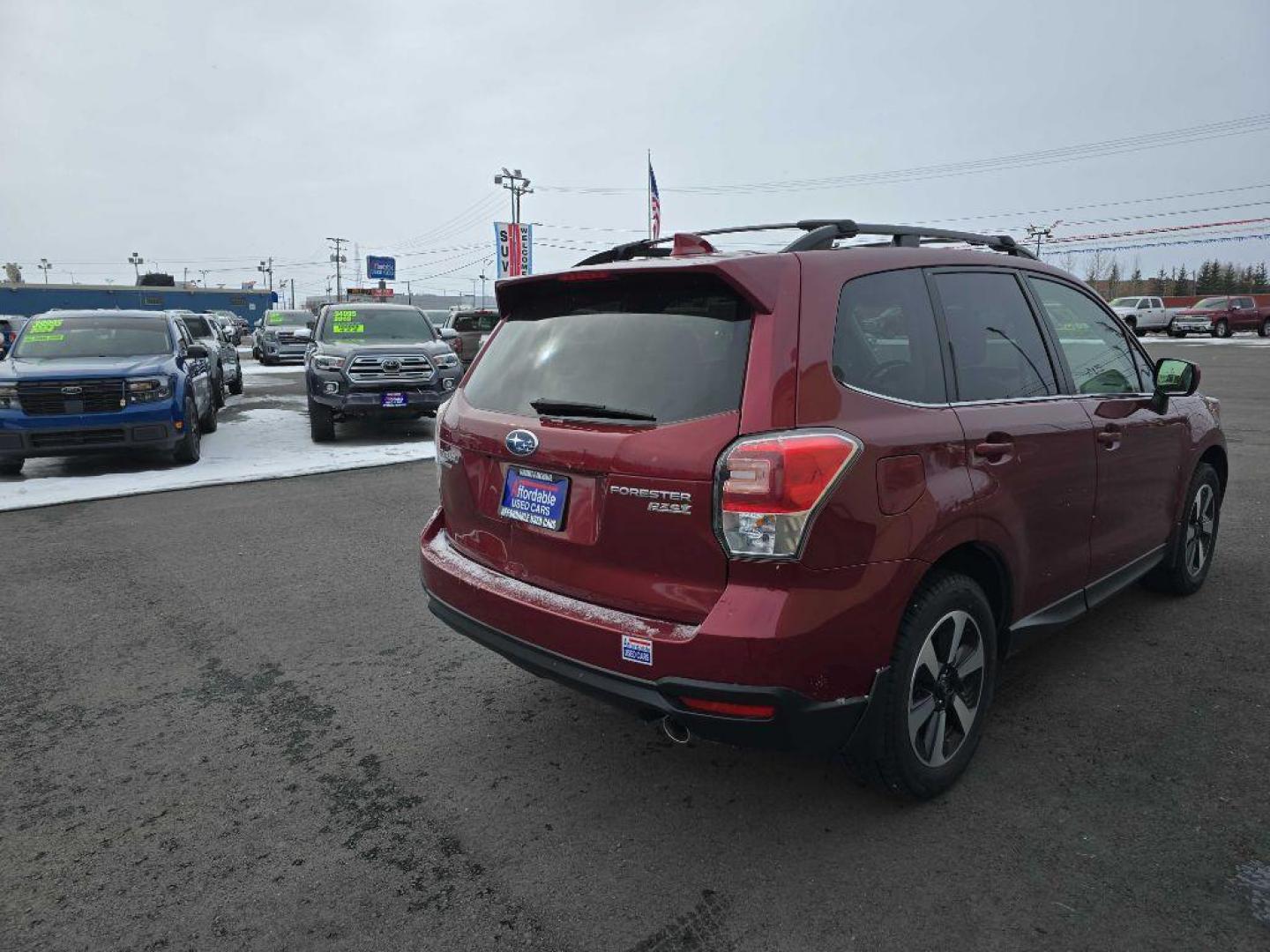 2017 RED SUBARU FORESTER 2.5I LIMITED (JF2SJAJC5HH) with an 2.5L engine, Continuously Variable transmission, located at 2525 S. Cushman, Fairbanks, AK, 99701, (907) 452-5707, 64.824036, -147.712311 - Photo#5