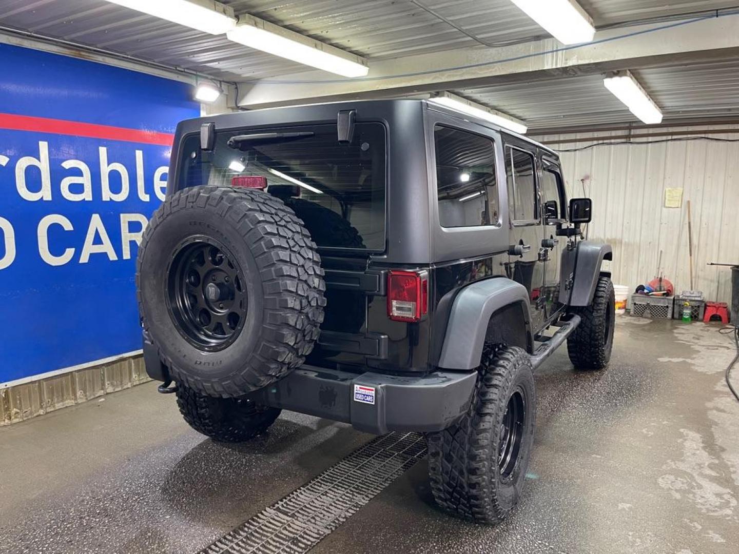 2017 BLACK JEEP WRANGLER UNLIMI SPORT (1C4BJWDG2HL) with an 3.6L engine, Automatic transmission, located at 2525 S. Cushman, Fairbanks, AK, 99701, (907) 452-5707, 64.824036, -147.712311 - Photo#2