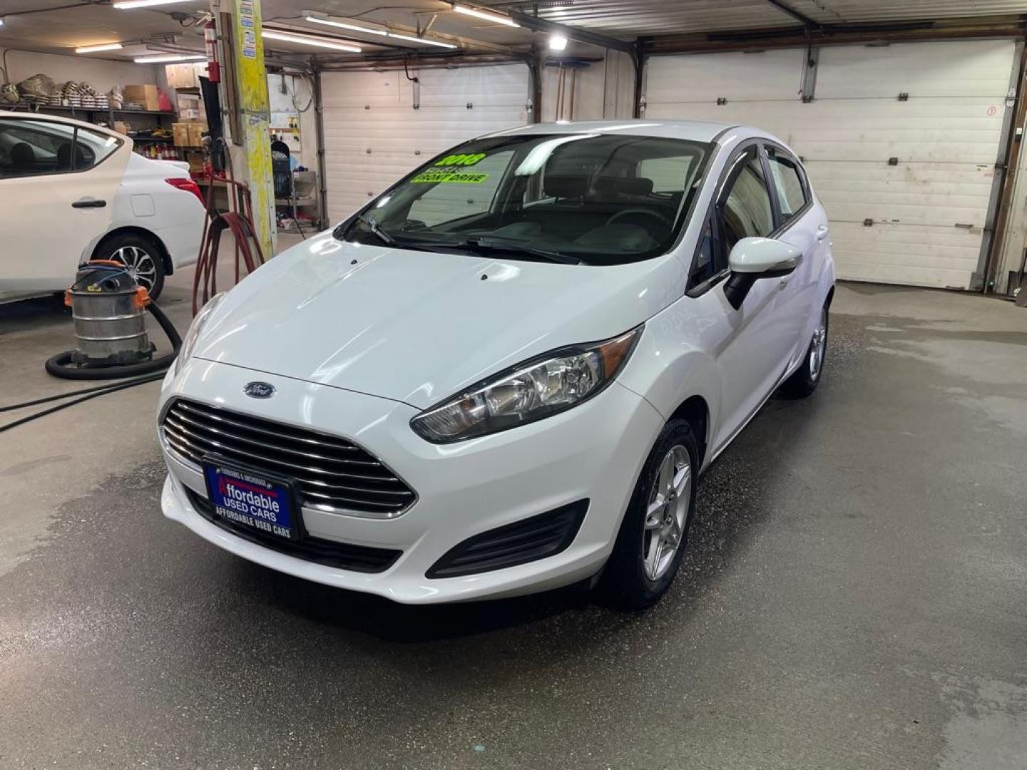 2018 WHITE FORD FIESTA SE (3FADP4EJ6JM) with an 1.6L engine, Automatic transmission, located at 2525 S. Cushman, Fairbanks, AK, 99701, (907) 452-5707, 64.824036, -147.712311 - Photo#1