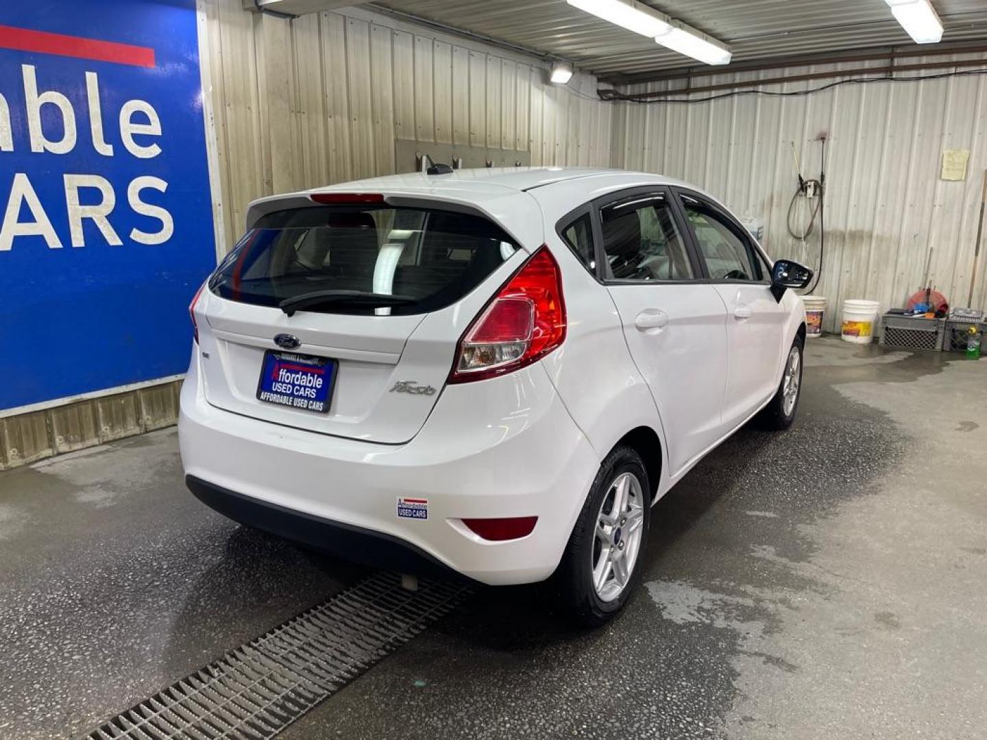 2018 WHITE FORD FIESTA SE (3FADP4EJ6JM) with an 1.6L engine, Automatic transmission, located at 2525 S. Cushman, Fairbanks, AK, 99701, (907) 452-5707, 64.824036, -147.712311 - Photo#2