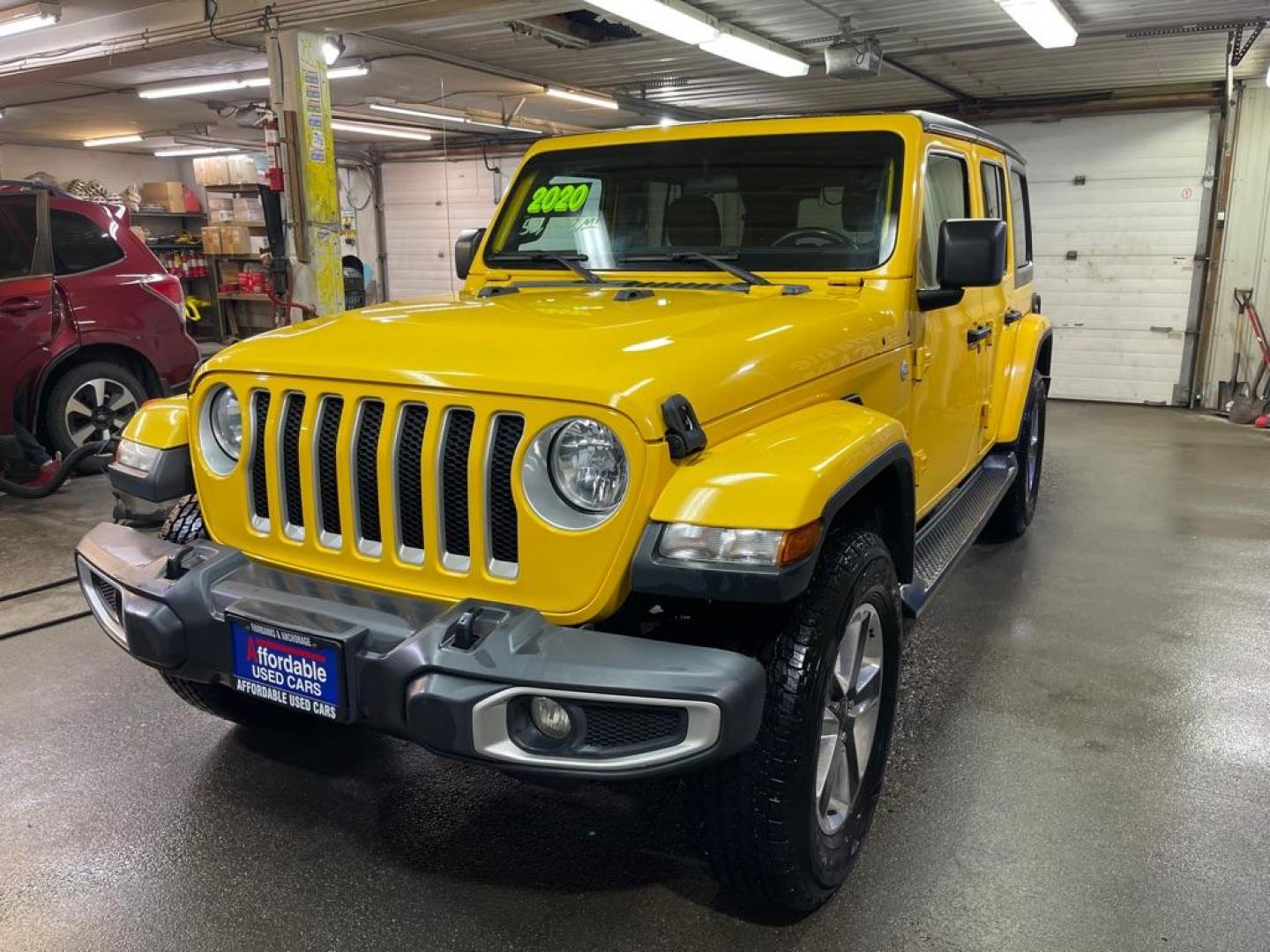 2020 YELLOW JEEP WRANGLER UNLIMI SAHARA (1C4HJXEN2LW) with an 2.0L engine, Automatic transmission, located at 2525 S. Cushman, Fairbanks, AK, 99701, (907) 452-5707, 64.824036, -147.712311 - Photo#1