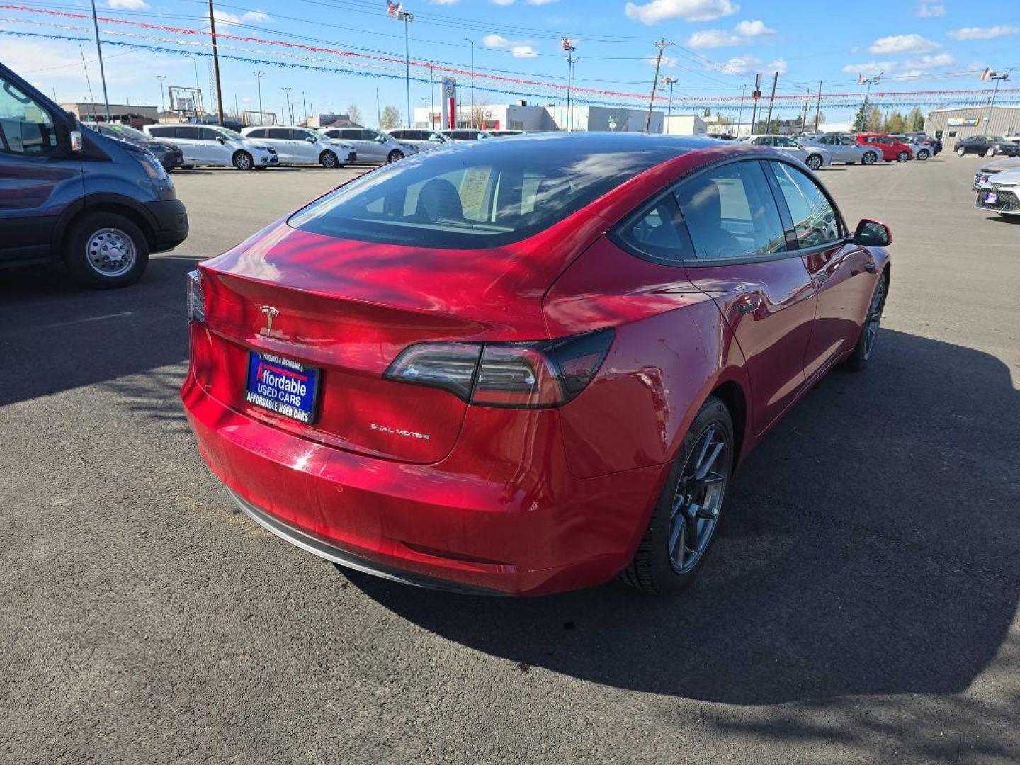 2021 RED TESLA MODEL 3 (5YJ3E1EB5MF) , Continuously Variable transmission, located at 2525 S. Cushman, Fairbanks, AK, 99701, (907) 452-5707, 64.824036, -147.712311 - Photo#2