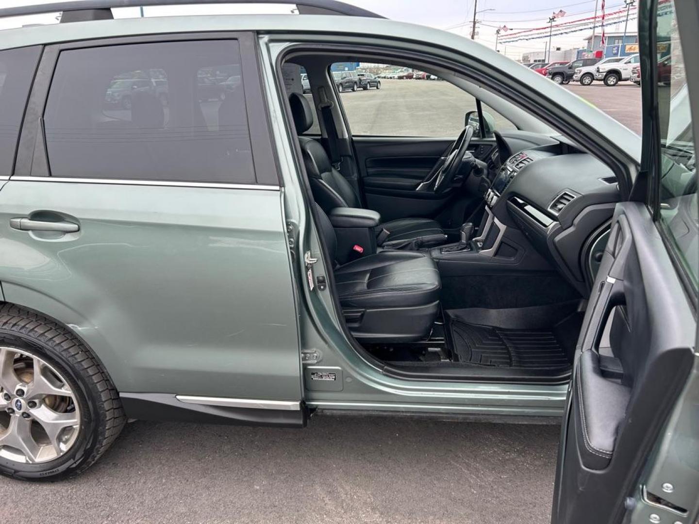 2018 GREEN SUBARU FORESTER 2.5I TOURING (JF2SJAWC8JH) with an 2.5L engine, Continuously Variable transmission, located at 2525 S. Cushman, Fairbanks, AK, 99701, (907) 452-5707, 64.824036, -147.712311 - Photo#4