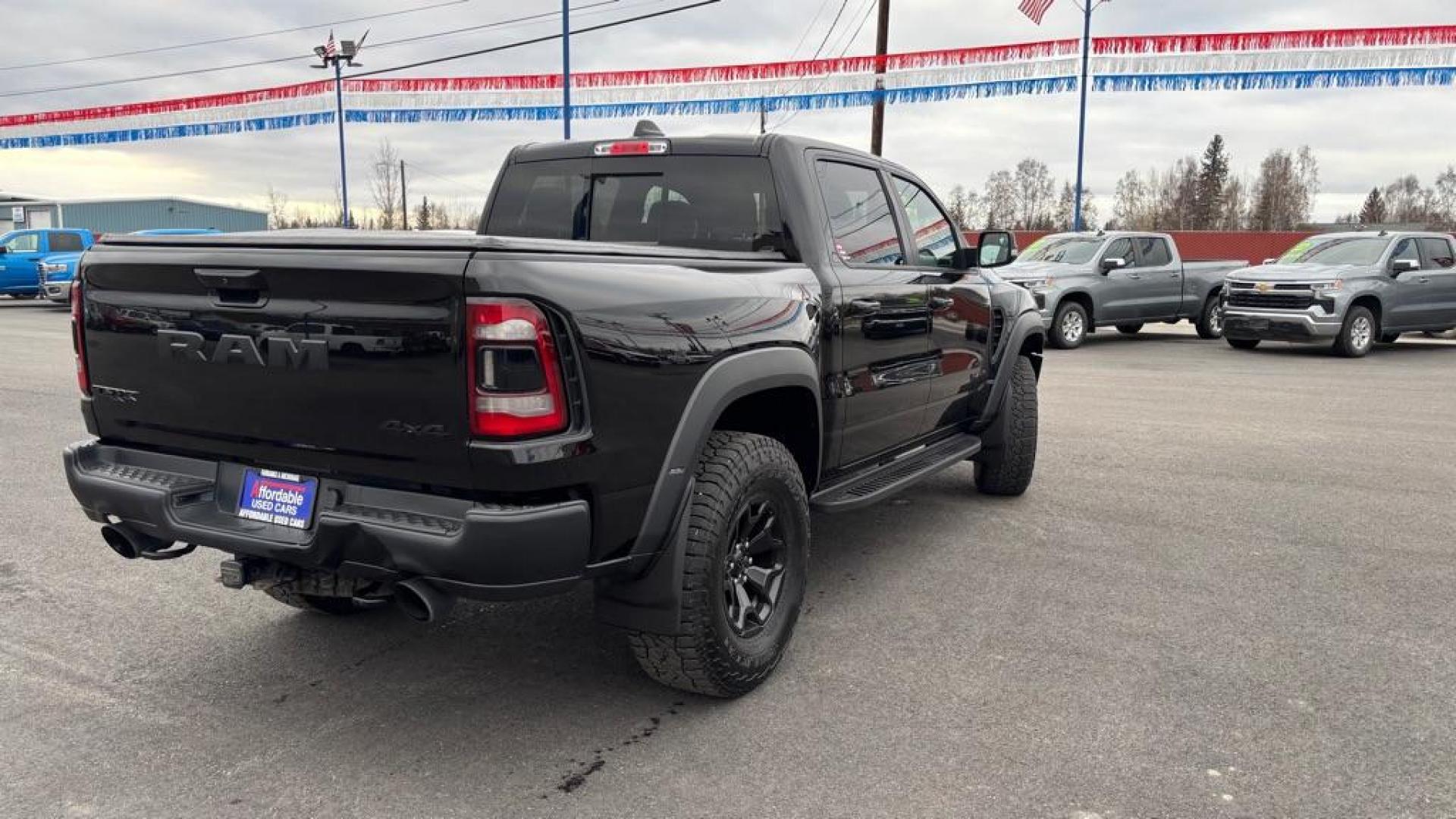 2022 BLACK RAM 1500 TRX TRX (1C6SRFU99NN) with an 6.2L engine, Automatic transmission, located at 2525 S. Cushman, Fairbanks, AK, 99701, (907) 452-5707, 64.824036, -147.712311 - Photo#5