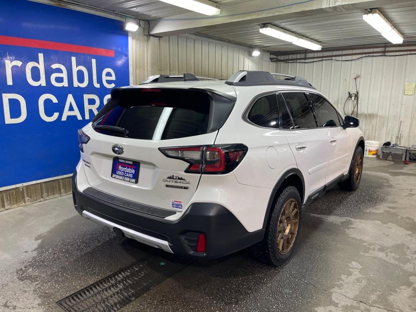 2021 WHITE SUBARU OUTBACK TOURING (4S4BTGPD7M3) with an 2.4L engine, Continuously Variable transmission, located at 2525 S. Cushman, Fairbanks, AK, 99701, (907) 452-5707, 64.824036, -147.712311 - Photo#2
