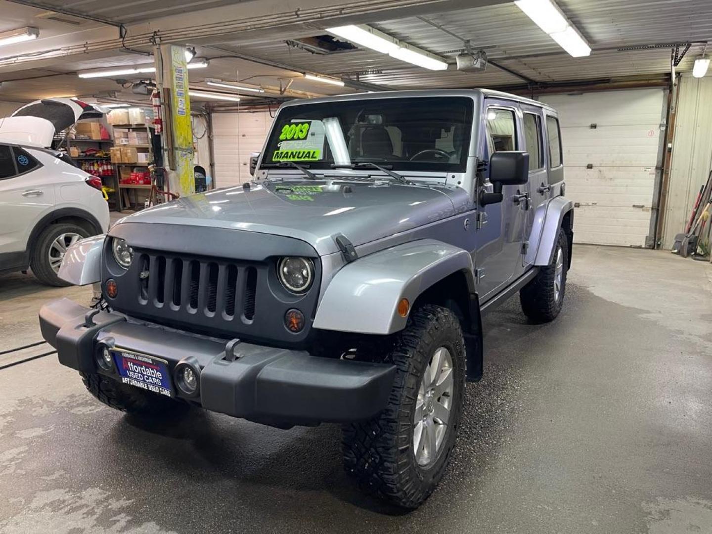 2013 SILVER JEEP WRANGLER UNLIMI SAHARA (1C4BJWEG7DL) with an 3.6L engine, Automatic transmission, located at 2525 S. Cushman, Fairbanks, AK, 99701, (907) 452-5707, 64.824036, -147.712311 - Photo#1