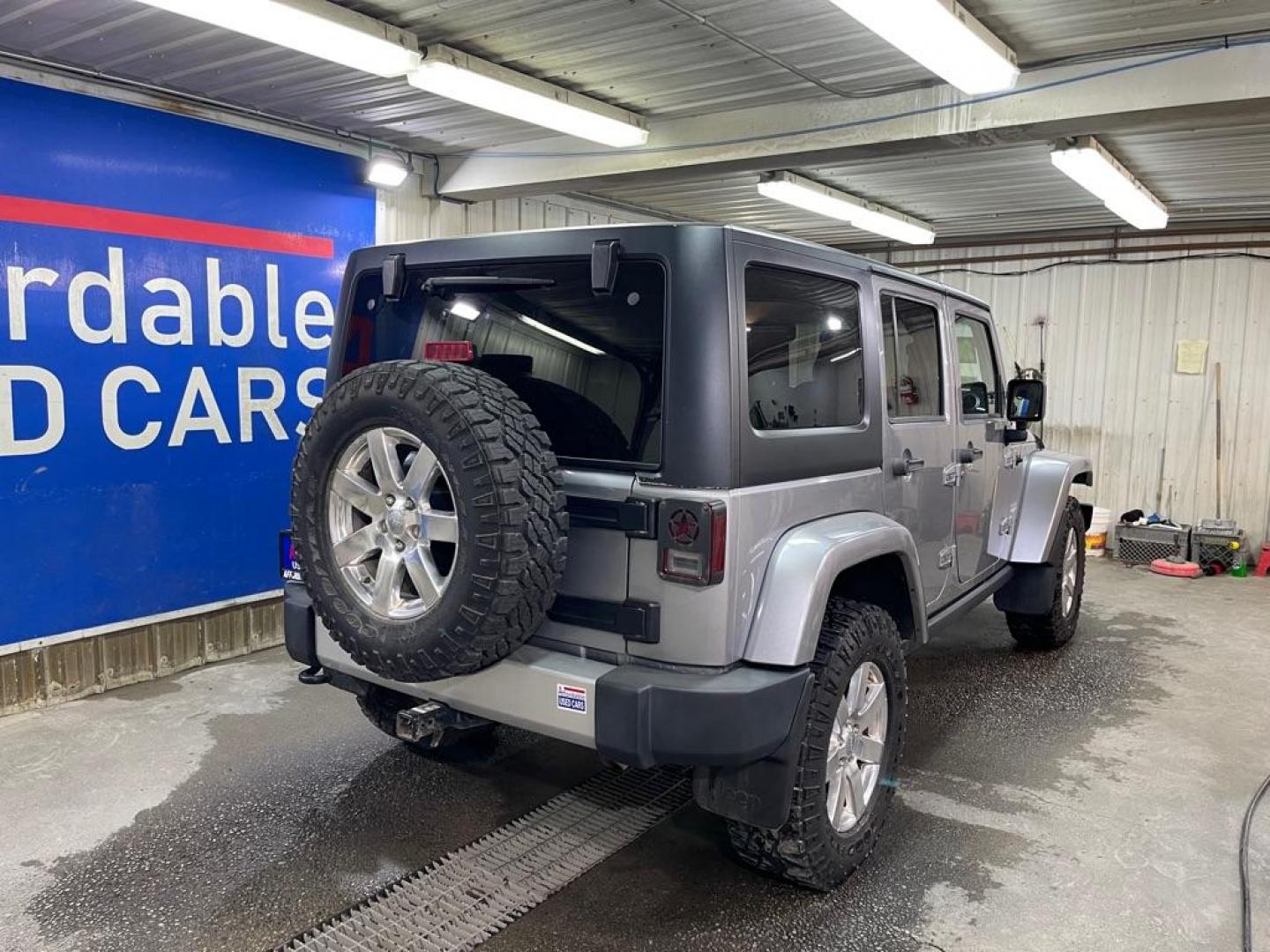 2013 SILVER JEEP WRANGLER UNLIMI SAHARA (1C4BJWEG7DL) with an 3.6L engine, Automatic transmission, located at 2525 S. Cushman, Fairbanks, AK, 99701, (907) 452-5707, 64.824036, -147.712311 - Photo#2