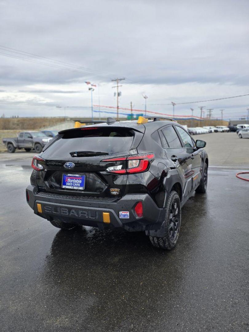 2024 BLACK SUBARU CROSSTREK WILDERNESS (4S4GUHU65R3) with an 2.5L engine, Continuously Variable transmission, located at 2525 S. Cushman, Fairbanks, AK, 99701, (907) 452-5707, 64.824036, -147.712311 - Photo#2