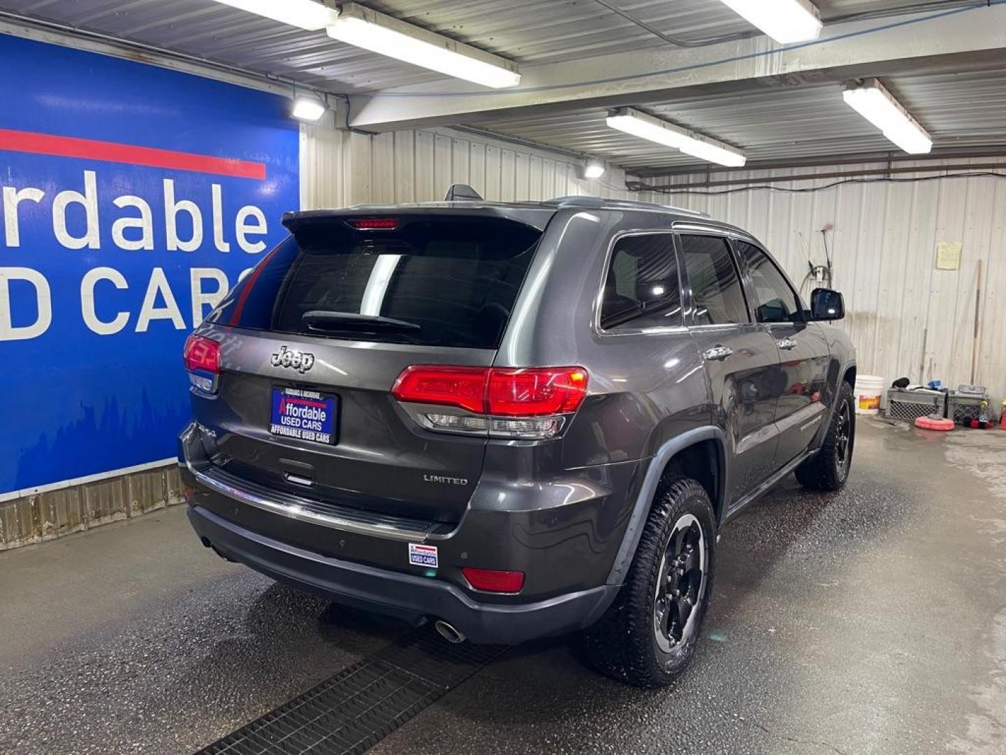 2014 GREY JEEP GRAND CHEROKEE LIMITED (1C4RJFBG1EC) with an 3.6L engine, Automatic transmission, located at 2525 S. Cushman, Fairbanks, AK, 99701, (907) 452-5707, 64.824036, -147.712311 - Photo#2