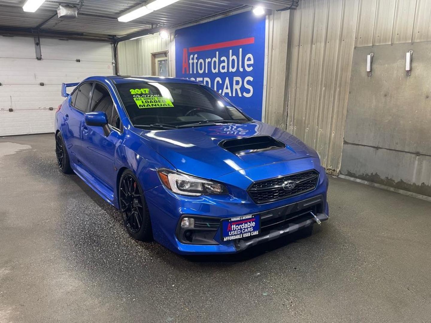 2017 BLUE SUBARU WRX LIMITED (JF1VA1J60H9) with an 2.0L engine, Manual transmission, located at 2525 S. Cushman, Fairbanks, AK, 99701, (907) 452-5707, 64.824036, -147.712311 - Photo#0