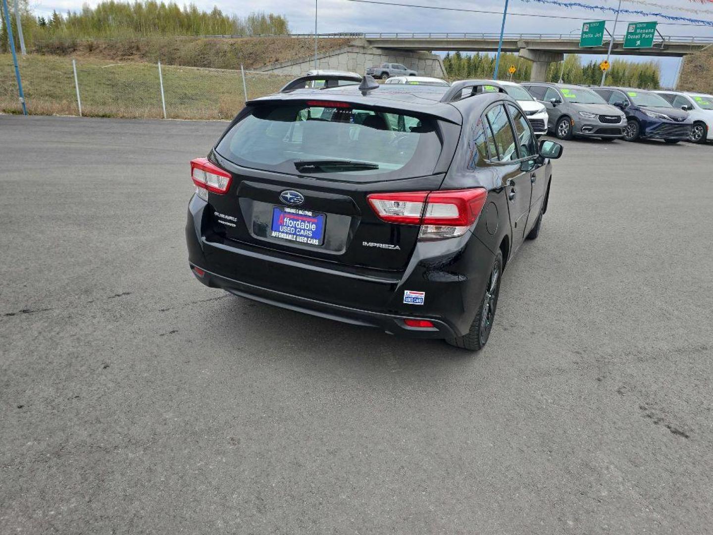 2018 BLACK SUBARU IMPREZA PREMIUM (4S3GTAB64J3) with an 2.0L engine, Continuously Variable transmission, located at 2525 S. Cushman, Fairbanks, AK, 99701, (907) 452-5707, 64.824036, -147.712311 - Photo#4