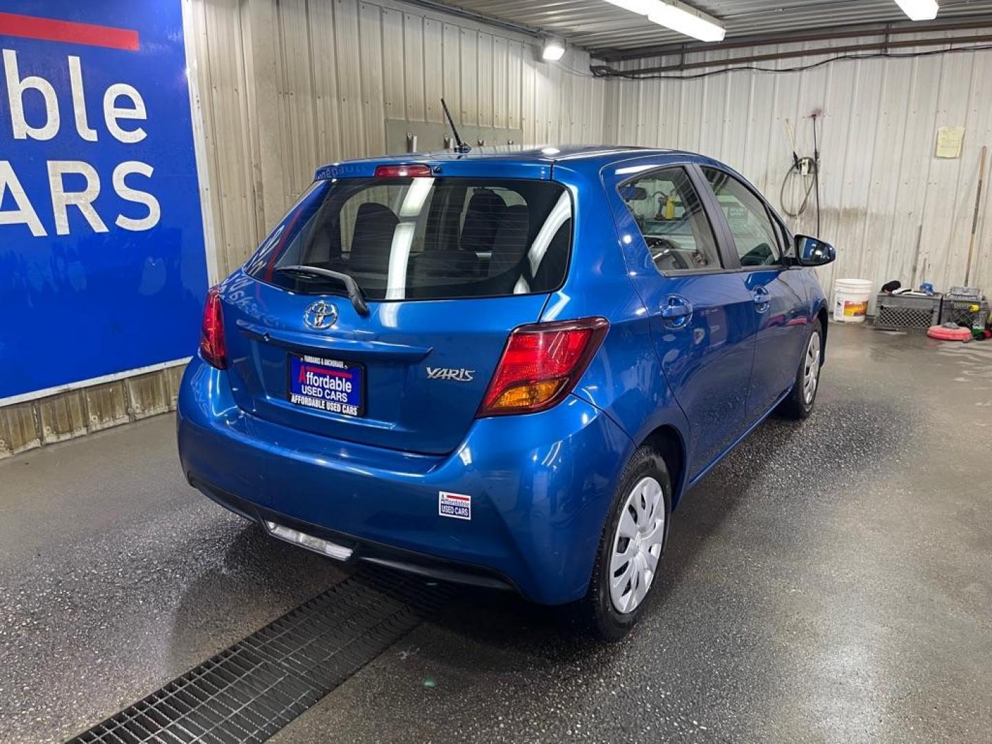 2015 BLUE TOYOTA YARIS (VNKKTUD34FA) with an 1.5L engine, Automatic transmission, located at 2525 S. Cushman, Fairbanks, AK, 99701, (907) 452-5707, 64.824036, -147.712311 - Photo#2