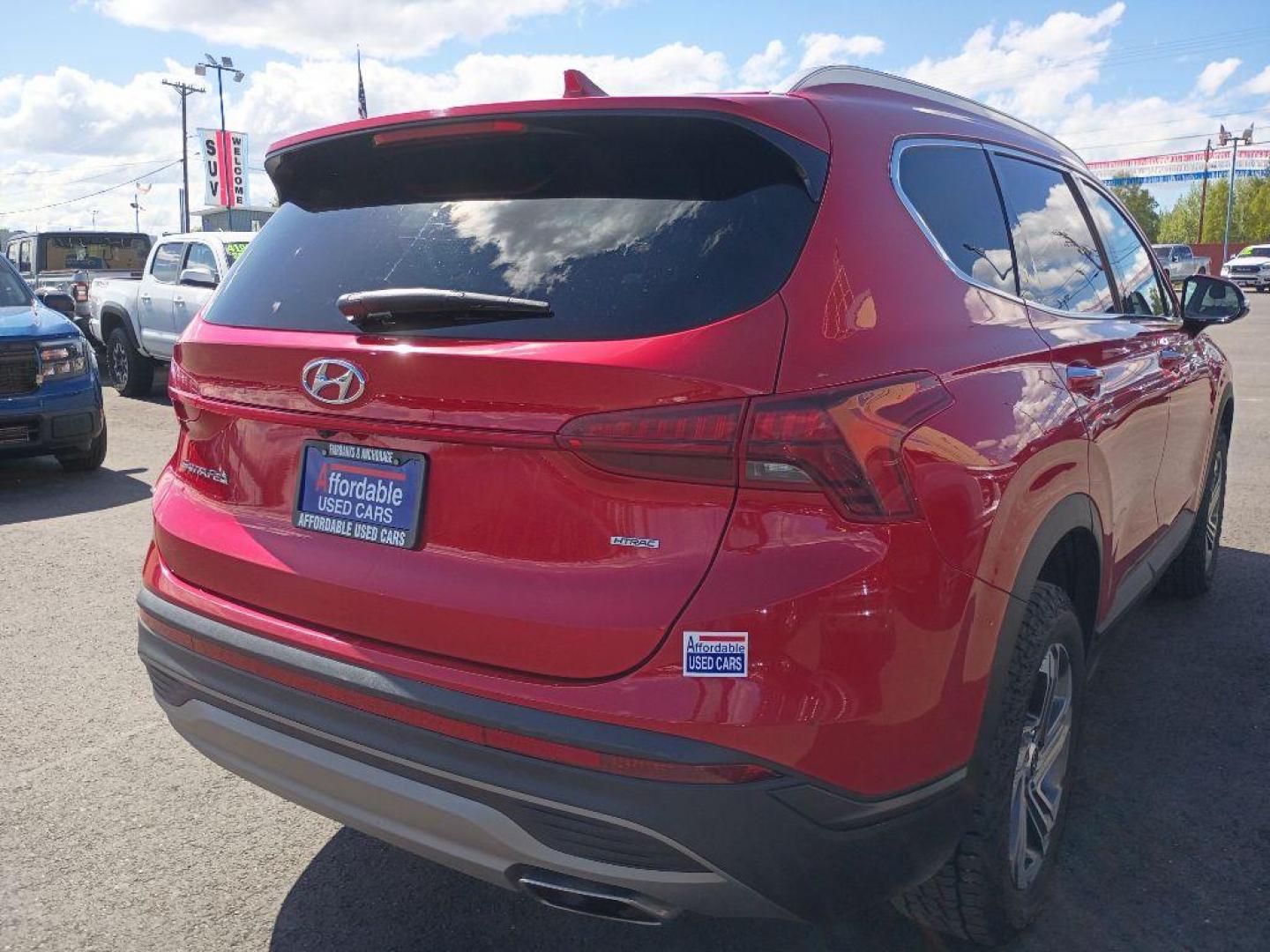 2023 RED HYUNDAI SANTA FE SEL (5NMS2DAJXPH) with an 2.5L engine, Automatic transmission, located at 2525 S. Cushman, Fairbanks, AK, 99701, (907) 452-5707, 64.824036, -147.712311 - Photo#3