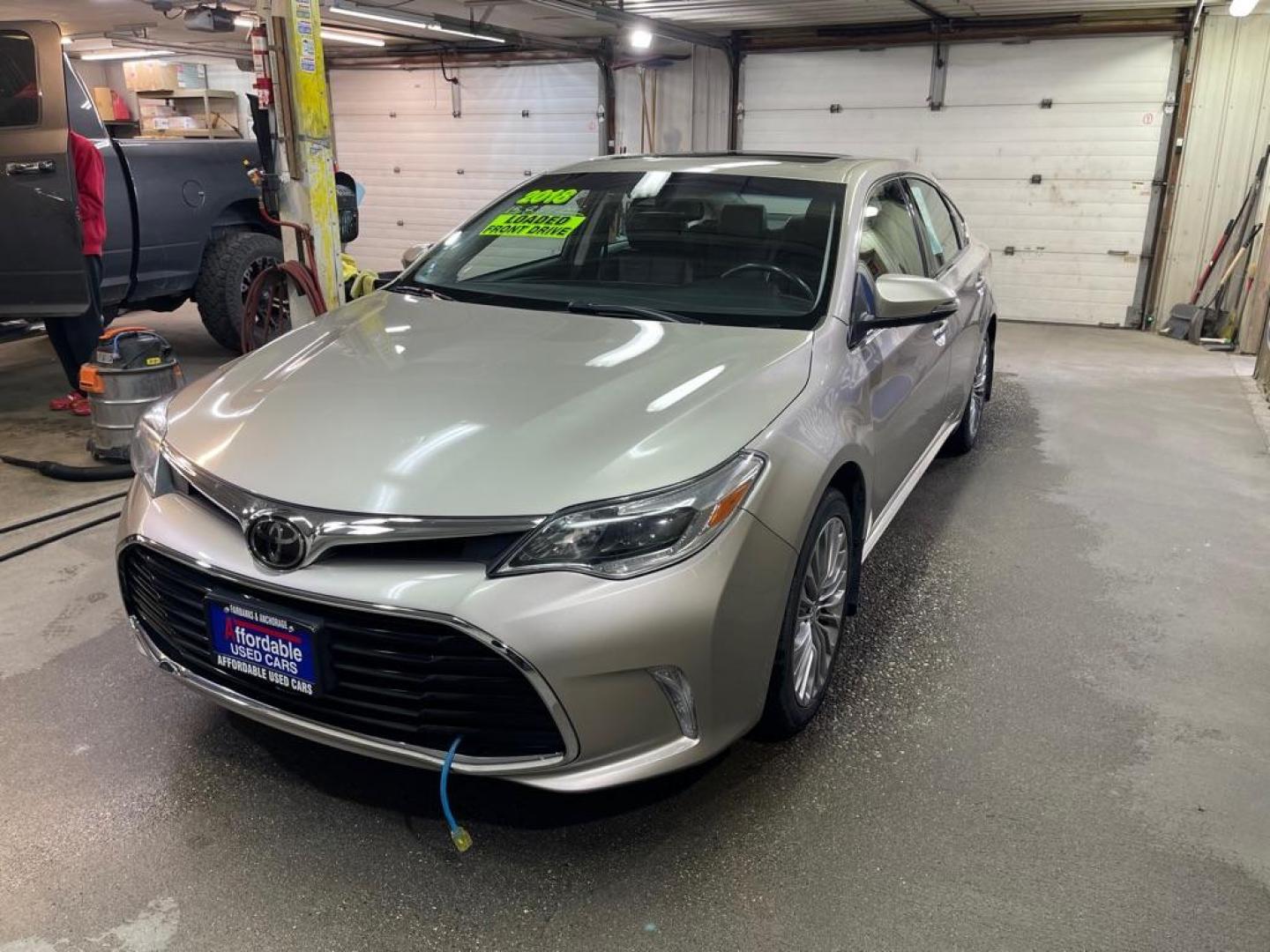 2018 TAN TOYOTA AVALON XLE (4T1BK1EB1JU) with an 3.5L engine, Automatic transmission, located at 2525 S. Cushman, Fairbanks, AK, 99701, (907) 452-5707, 64.824036, -147.712311 - Photo#1