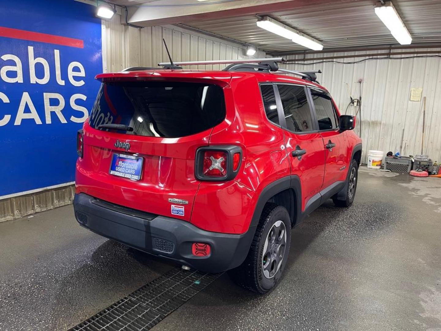 2015 RED JEEP RENEGADE LATITUDE (ZACCJABH9FP) with an 1.4L engine, 6-Speed Manual transmission, located at 2525 S. Cushman, Fairbanks, AK, 99701, (907) 452-5707, 64.824036, -147.712311 - Photo#2