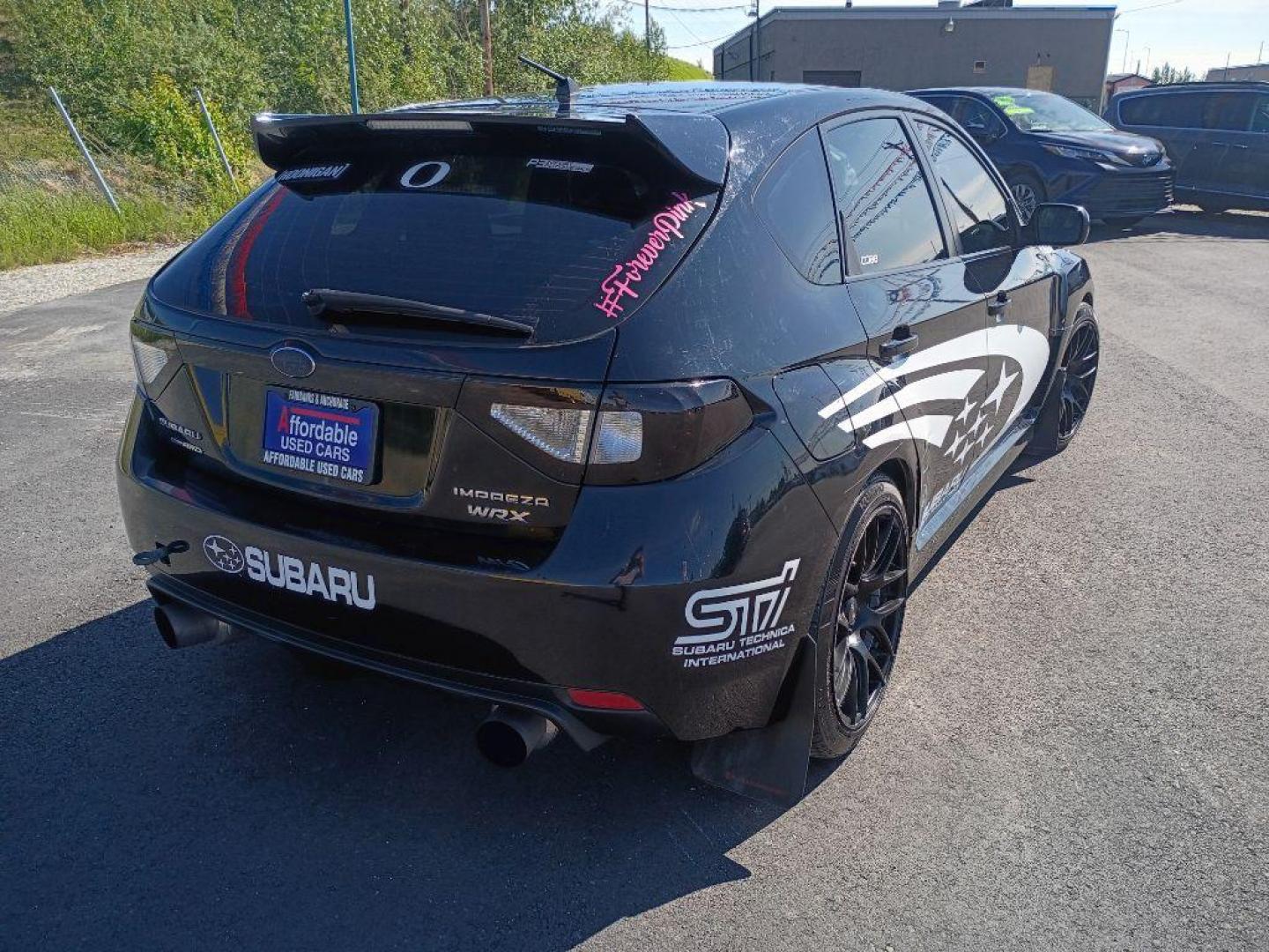 2011 BLACK SUBARU IMPREZA WRX (JF1GR7E67BG) with an 2.5L engine, Automatic transmission, located at 2525 S. Cushman, Fairbanks, AK, 99701, (907) 452-5707, 64.824036, -147.712311 - Photo#3