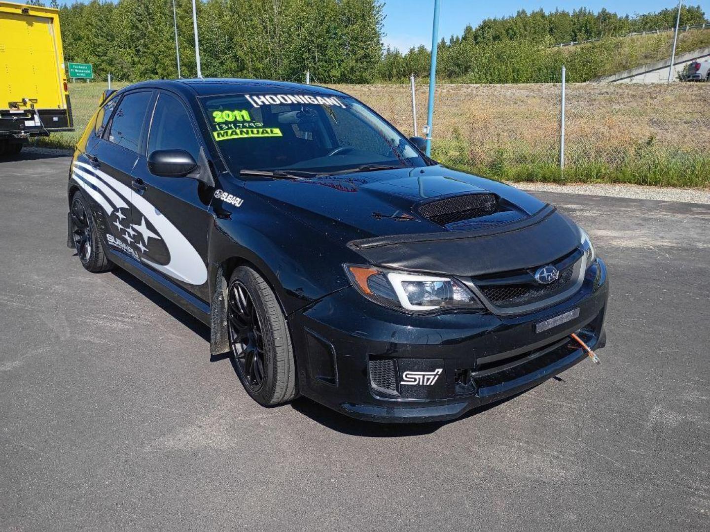 2011 BLACK SUBARU IMPREZA WRX (JF1GR7E67BG) with an 2.5L engine, Automatic transmission, located at 2525 S. Cushman, Fairbanks, AK, 99701, (907) 452-5707, 64.824036, -147.712311 - Photo#0