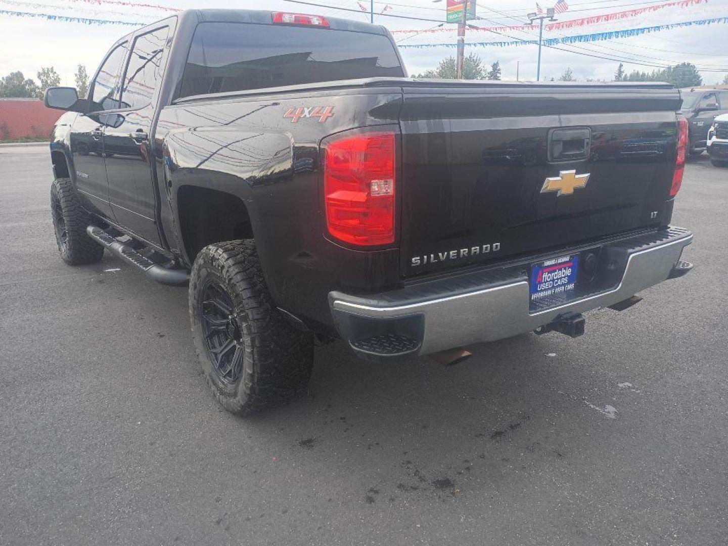2018 BLACK CHEVROLET SILVERADO 1500 LT (3GCUKREC5JG) with an 5.3L engine, Automatic transmission, located at 2525 S. Cushman, Fairbanks, AK, 99701, (907) 452-5707, 64.824036, -147.712311 - Photo#2