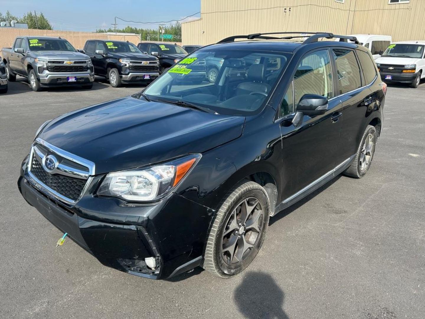 2015 BLACK SUBARU FORESTER 2.0XT TOURING (JF2SJGUC7FH) with an 2.0L engine, Continuously Variable transmission, located at 2525 S. Cushman, Fairbanks, AK, 99701, (907) 452-5707, 64.824036, -147.712311 - Photo#0