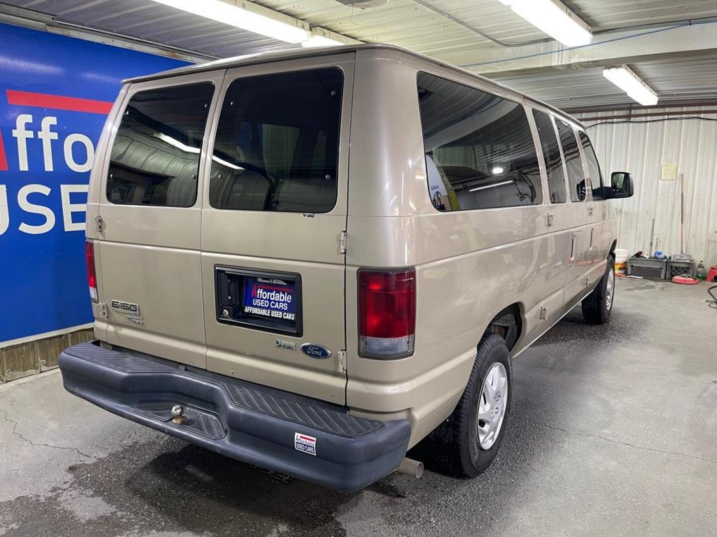 2009 BEIGE FORD ECONOLINE E150 WAGON (1FMNE11W09D) with an 4.6L engine, Automatic transmission, located at 2525 S. Cushman, Fairbanks, AK, 99701, (907) 452-5707, 64.824036, -147.712311 - Photo#2