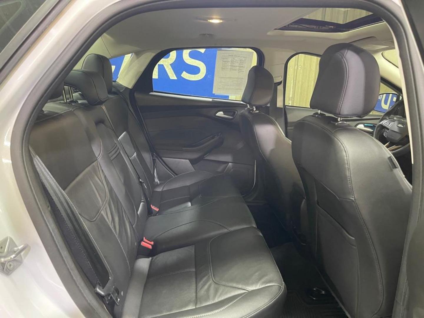 2016 WHITE FORD FOCUS SE (1FADP3F2XGL) with an 2.0L engine, Automatic transmission, located at 2525 S. Cushman, Fairbanks, AK, 99701, (907) 452-5707, 64.824036, -147.712311 - Photo#4